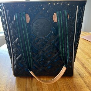 Stylish Black Consuela Tote Bag with Green Accents and Blue Interior